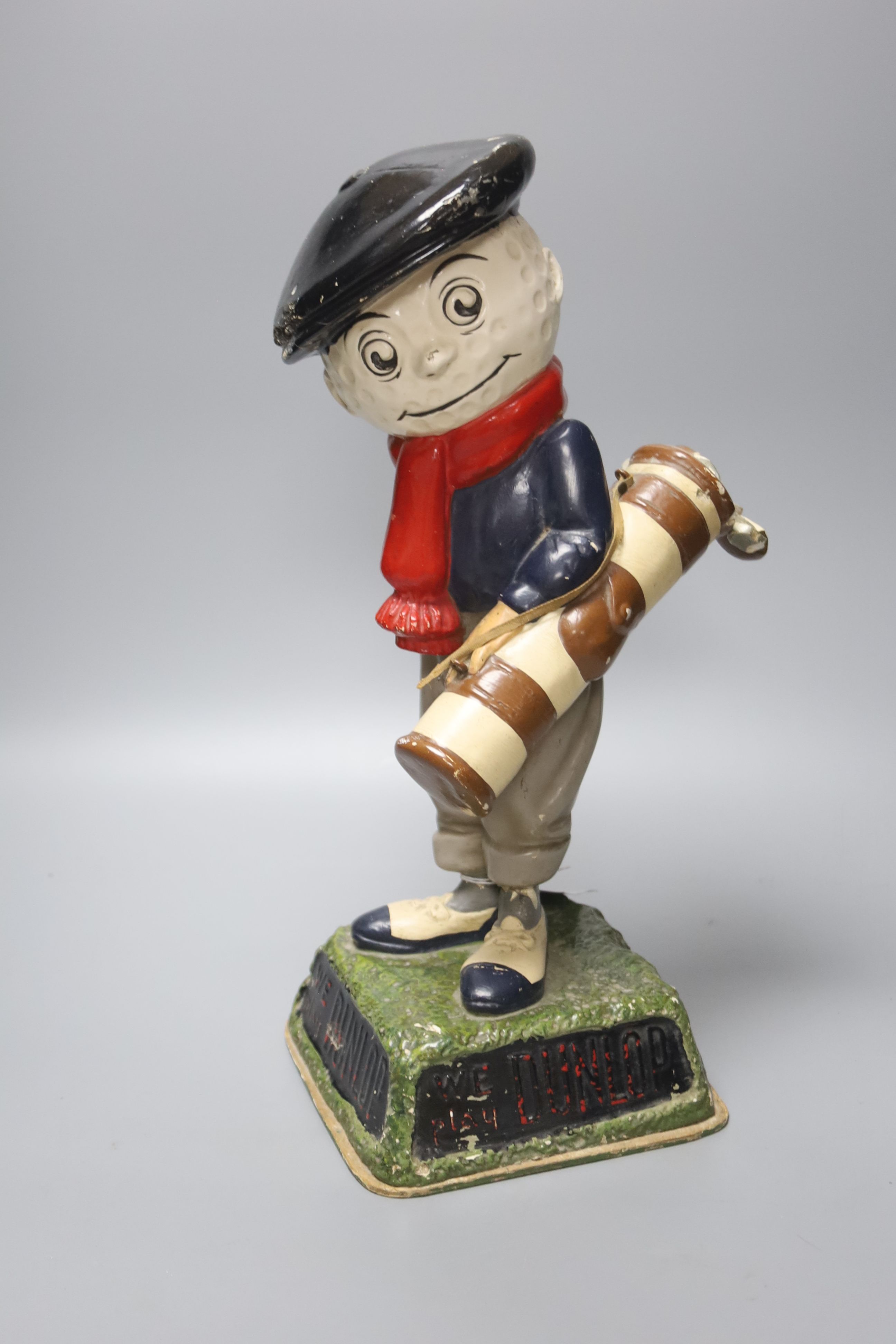 A composition advertising golfing figure We Play Dunlop, height 37cm